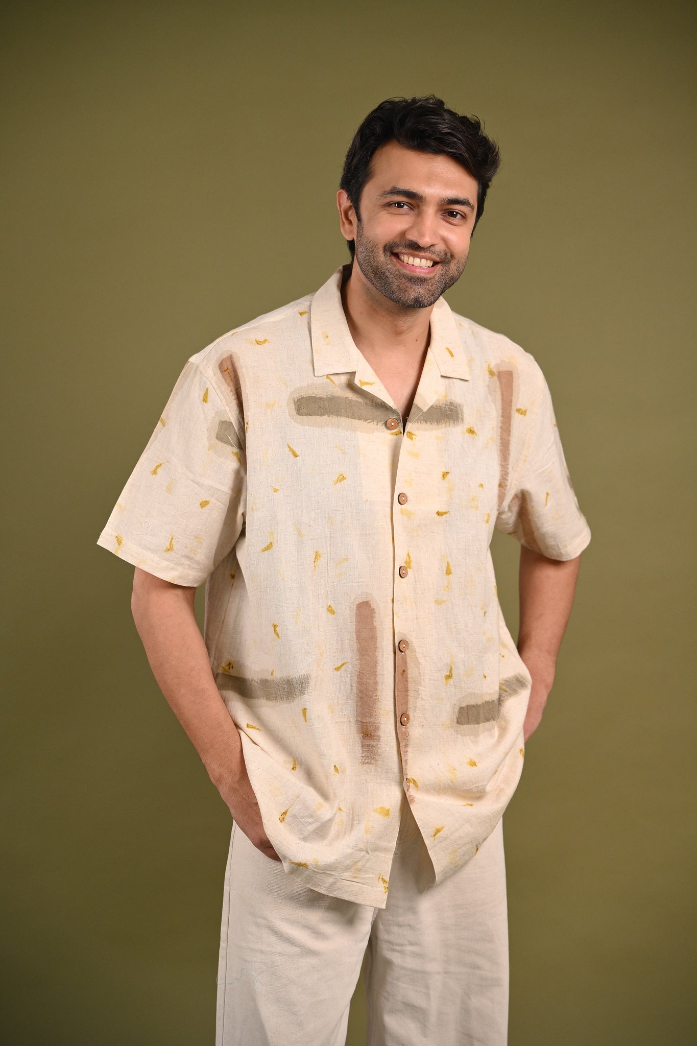 Nagma Shirt – Gender-inclusive handspun, handwoven cotton shirt, eco-printed with marigold petals and hand-painted with natural pigments for a unique botanical design.