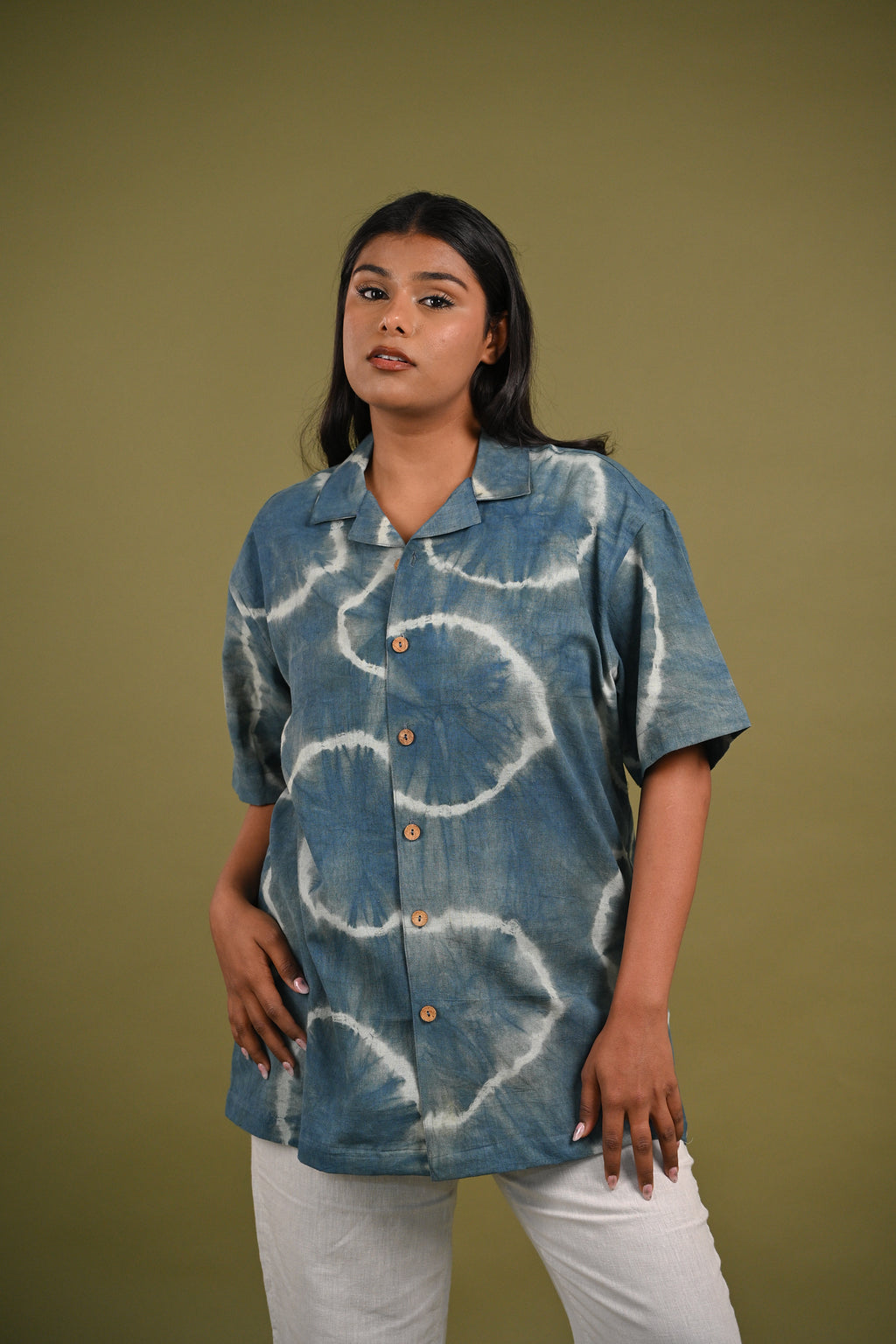Model wearing the Nilima Shirt, showcasing its relaxed fit and handcrafted Shibori indigo patterns, perfect for effortless, sustainable fashion.