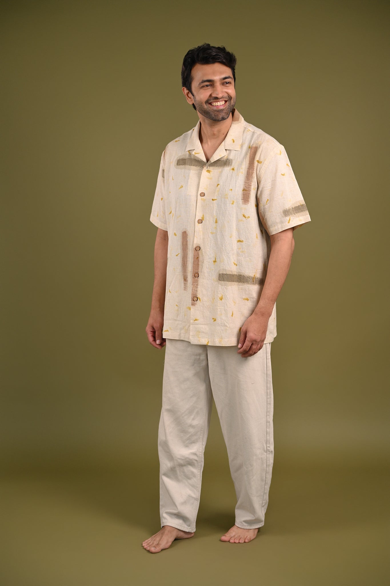 Model wearing the Nagma Shirt, highlighting its relaxed fit and nature-inspired eco-print patterns, a perfect blend of artistry and sustainability.