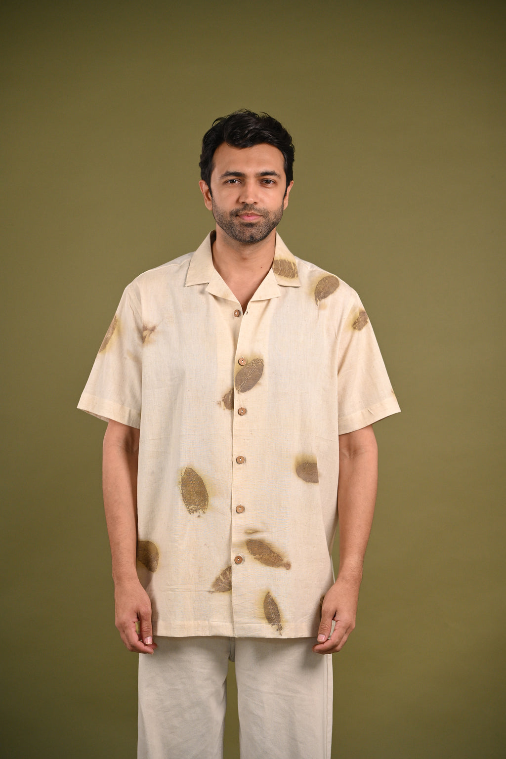 Model wearing the Peru Shirt styled with neutral trousers, embracing sustainable fashion.